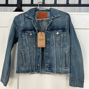 This is a Lucky Brand denim jean jacket. Size small